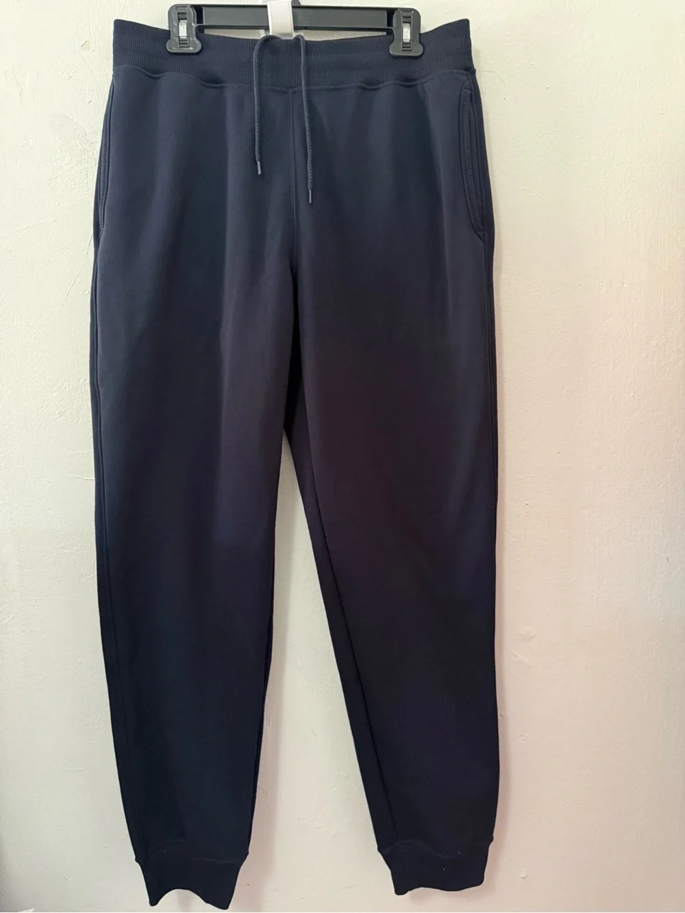 Navy blue UNIQLO Heattech pile lined sweatpants in size L. NWT